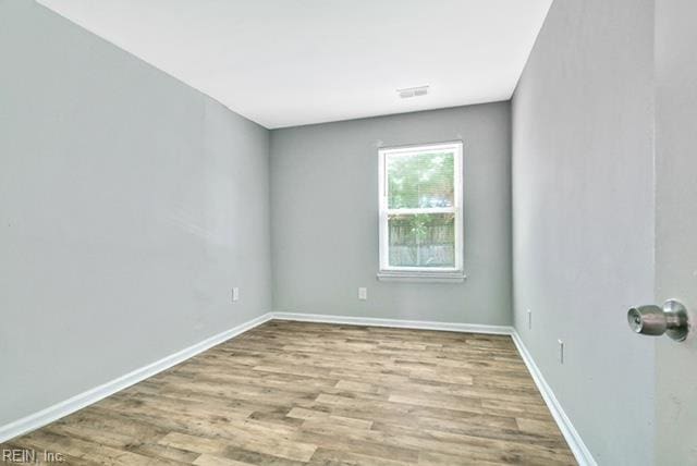 1342 W 39th St, Norfolk, VA 23508 - unfurnished room featuring wood finished floors and baseboards