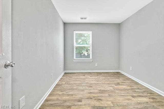 1342 W 39th St, Norfolk, VA 23508 - empty room featuring wood finished floors and baseboards