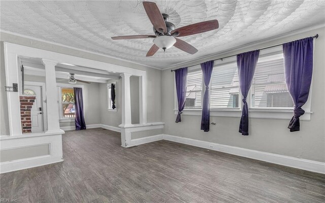 2532 Ballentine Blvd, Norfolk, VA 23509 - unfurnished room featuring decorative columns, a ceiling fan, baseboards, and crown molding