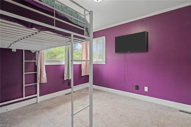 8 Llewellyn St, Portsmouth, VA 23707 - unfurnished bedroom featuring carpet flooring, baseboards, and crown molding
