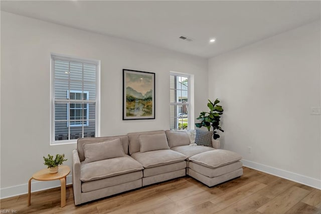 1028 W 36th St, Norfolk, VA 23508 - living room with light wood finished floors, baseboards, and recessed lighting