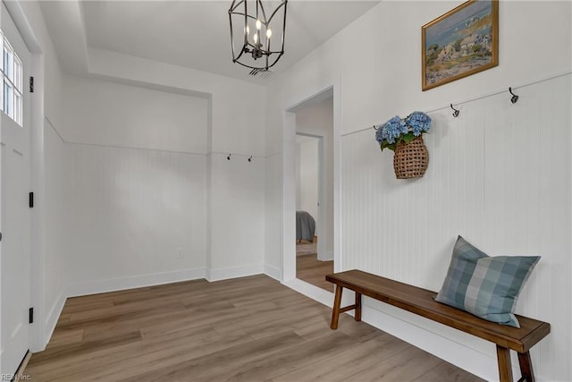 1028 W 36th St, Norfolk, VA 23508 - mudroom with a chandelier, light wood finished floors, and baseboards