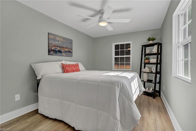 1028 W 36th St, Norfolk, VA 23508 - bedroom with light wood finished floors, baseboards, and a ceiling fan