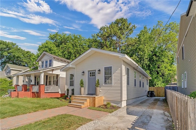 1028 W 36th St, Norfolk, VA 23508 - bungalow-style house with covered porch and driveway
