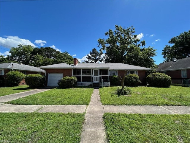 1702 Marshall Ave, Newport News, VA 23607 - ranch-style home featuring a sunroom, an attached garage, a front yard, and driveway
