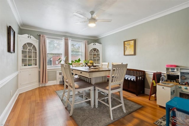 1505 Meads Rd Unit A-2, Norfolk, VA 23505 - dining room with crown molding, a ceiling fan, wood finished floors, and baseboards