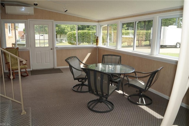9 Chowning Dr, Hampton, VA 23664 - sunroom with lofted ceiling, an AC wall unit, plenty of natural light, carpet, and baseboards