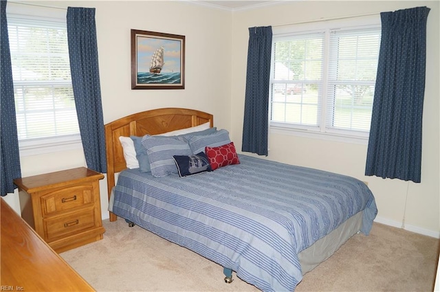 9 Chowning Dr, Hampton, VA 23664 - bedroom with carpet floors, multiple windows, and crown molding