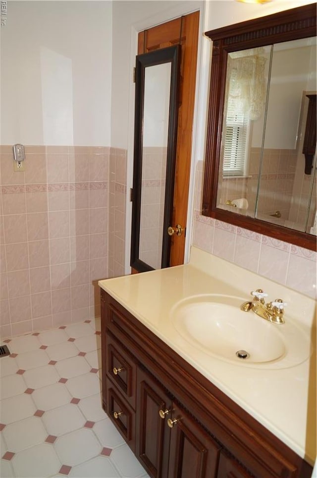9 Chowning Dr, Hampton, VA 23664 - bathroom featuring vanity and tile walls