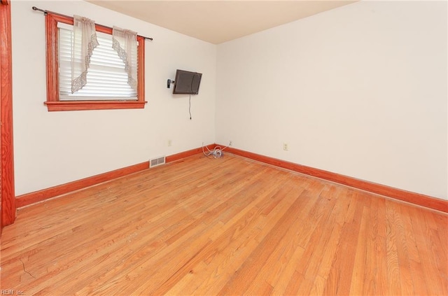 101 Elmhurst Ln, Portsmouth, VA 23701 - empty room with baseboards and light wood-style floors