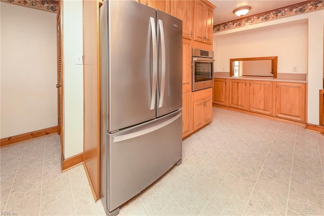 101 Elmhurst Ln, Portsmouth, VA 23701 - kitchen with appliances with stainless steel finishes, baseboards, and light countertops