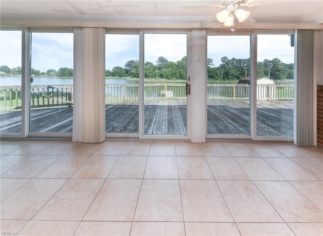 101 Elmhurst Ln, Portsmouth, VA 23701 - tiled empty room with a water view, ceiling fan, healthy amount of natural light, and view of wooded area