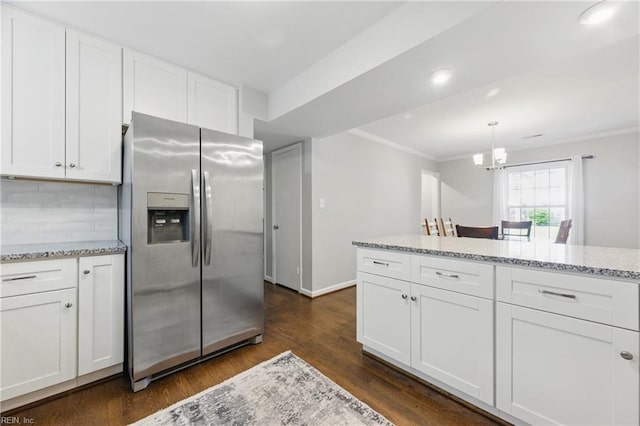 101 Huxley Pl, Newport News, VA 23606 - kitchen with stainless steel fridge, crown molding, dark wood finished floors, white cabinetry, and decorative backsplash