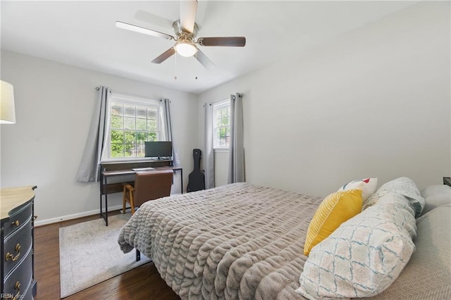 101 Huxley Pl, Newport News, VA 23606 - bedroom featuring dark wood-style flooring, a ceiling fan, and baseboards