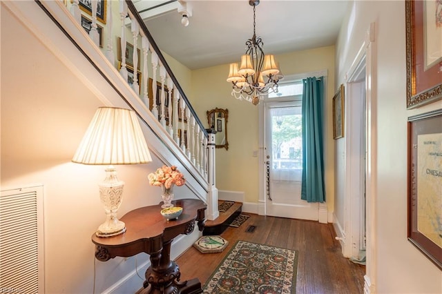 218 Mt Vernon Ave, Portsmouth, VA 23707 - foyer entrance featuring a chandelier, stairs, wood-type flooring, and baseboards