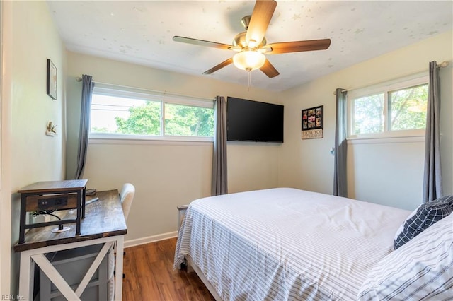 8121 Walters Dr, Norfolk, VA 23518 - bedroom with dark wood finished floors and a ceiling fan