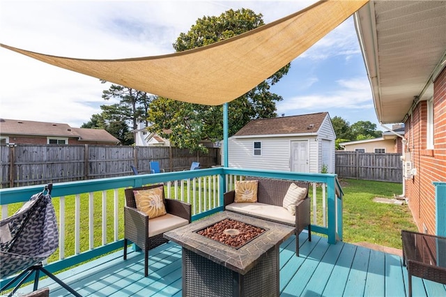 8121 Walters Dr, Norfolk, VA 23518 - wooden deck with an outdoor structure, a fenced backyard, and an outdoor living space with a fire pit