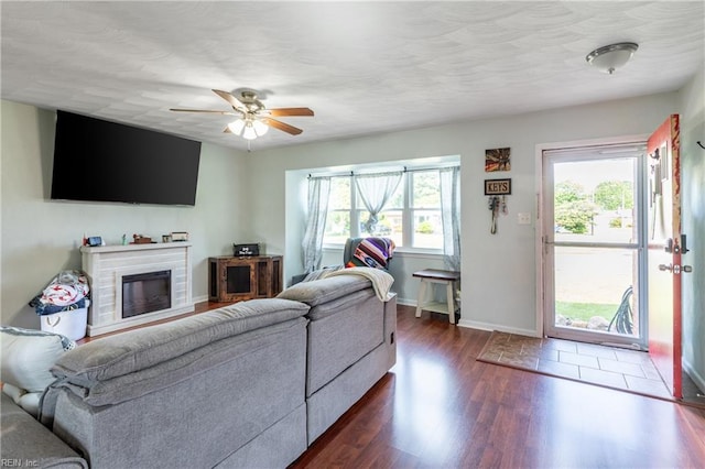 8121 Walters Dr, Norfolk, VA 23518 - living room featuring a ceiling fan, wood finished floors, and a glass covered fireplace