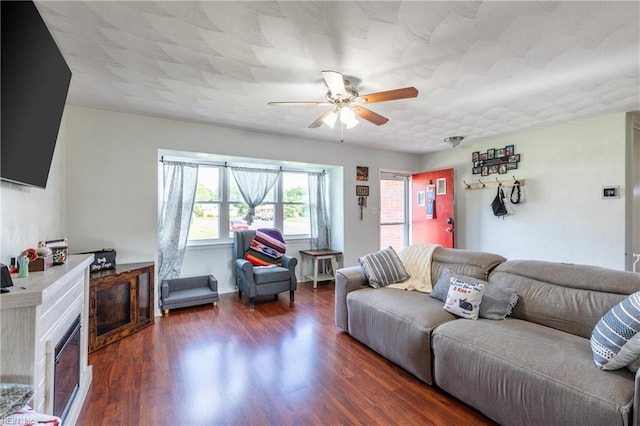 8121 Walters Dr, Norfolk, VA 23518 - living area featuring ceiling fan, wood finished floors, and a fireplace
