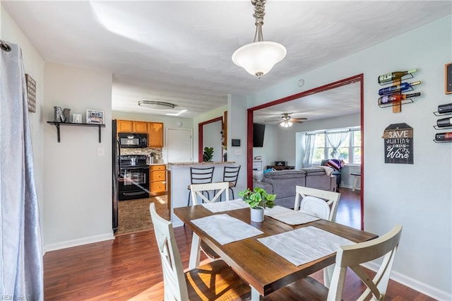 8121 Walters Dr, Norfolk, VA 23518 - dining space featuring dark wood-style floors and a ceiling fan