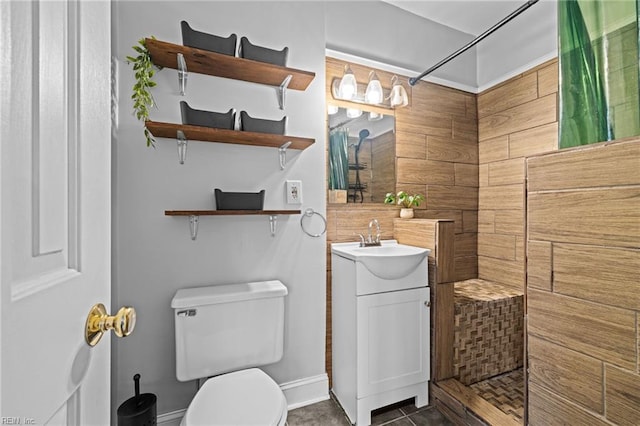 632 Raleigh Ave Unit 3, Norfolk, VA 23507 - bathroom with vanity, tiled shower, toilet, tile patterned floors, and baseboards