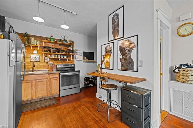 632 Raleigh Ave Unit 3, Norfolk, VA 23507 - kitchen with appliances with stainless steel finishes, dark wood-style flooring, a sink, open shelves, and rail lighting
