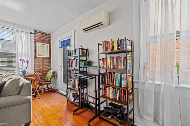 632 Raleigh Ave Unit 3, Norfolk, VA 23507 - sitting room featuring a wall mounted AC and wood finished floors