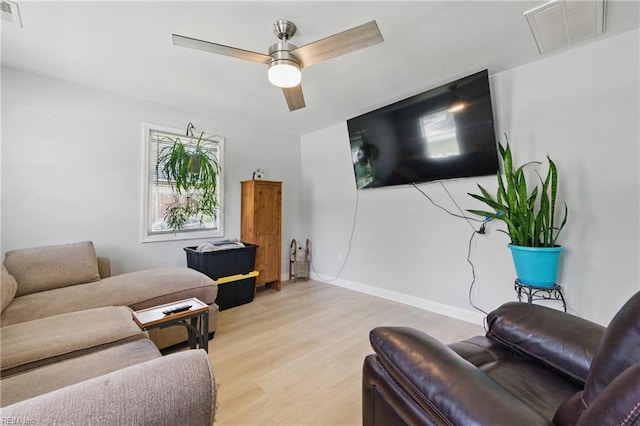 611 74th St, Newport News, VA 23605 - living room with wood finished floors and ceiling fan