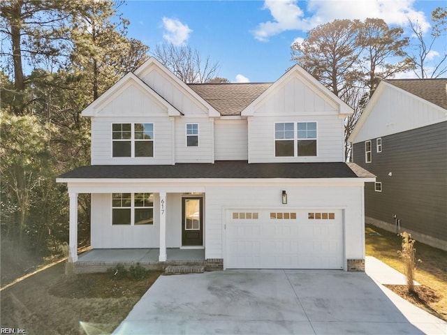 617 Dam Neck Rd, Virginia Beach, VA 23454 - view of front of house featuring board and batten siding, a porch, a shingled roof, and concrete driveway