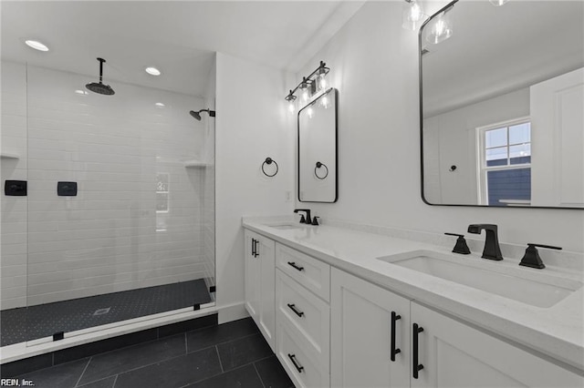 617 Dam Neck Rd, Virginia Beach, VA 23454 - full bath with double vanity, tile patterned flooring, a tile shower, and recessed lighting