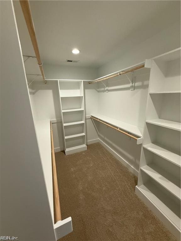 617 Dam Neck Rd, Virginia Beach, VA 23454 - walk in closet with carpet flooring