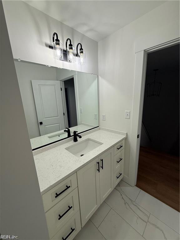 617 Dam Neck Rd, Virginia Beach, VA 23454 - bathroom with vanity and marble finish flooring
