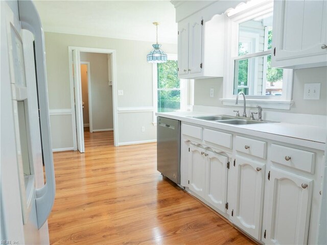 400 Fernwood Farms Rd, Chesapeake, VA 23320 - kitchen with dishwasher, a sink, white cabinetry, and hanging light fixtures