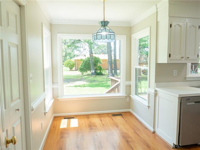 400 Fernwood Farms Rd, Chesapeake, VA 23320 - unfurnished dining area with light wood-style flooring, healthy amount of natural light, baseboards, and ornamental molding