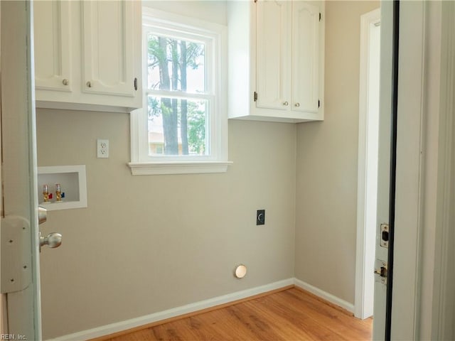 400 Fernwood Farms Rd, Chesapeake, VA 23320 - laundry area featuring electric dryer hookup, hookup for a washing machine, baseboards, light wood-type flooring, and cabinet space