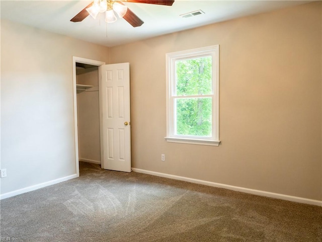 400 Fernwood Farms Rd, Chesapeake, VA 23320 - unfurnished bedroom with carpet flooring, baseboards, a closet, and a ceiling fan