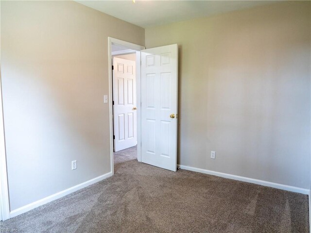 400 Fernwood Farms Rd, Chesapeake, VA 23320 - empty room with carpet and baseboards