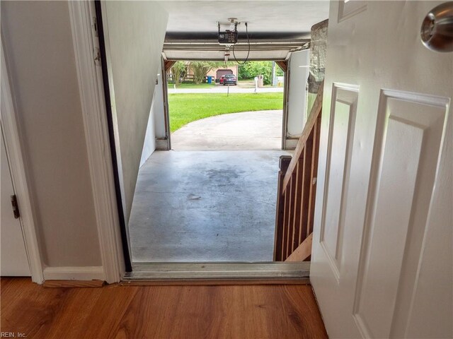 400 Fernwood Farms Rd, Chesapeake, VA 23320 - garage featuring a porch, water heater, and a garage door opener