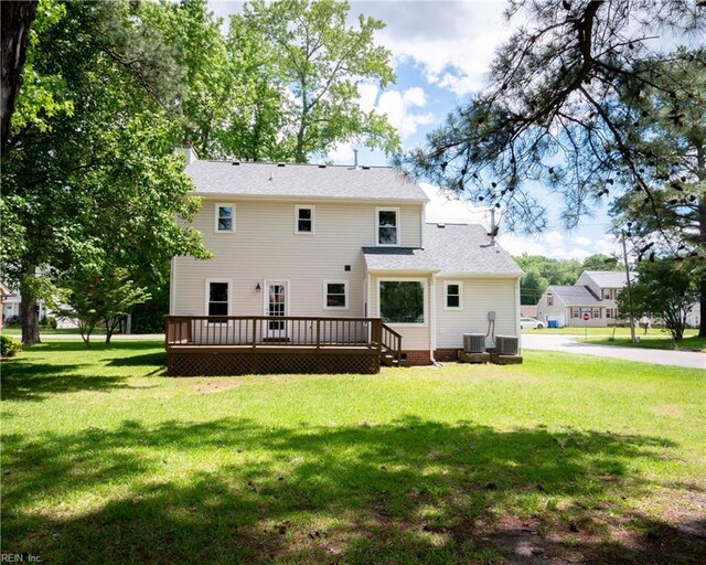 400 Fernwood Farms Rd, Chesapeake, VA 23320 - rear view of house with a wooden deck, a yard, and central air condition unit