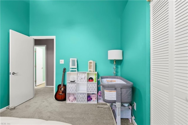 606 Queens Xing, Williamsburg, VA 23185 - carpeted home office with baseboards and a high ceiling