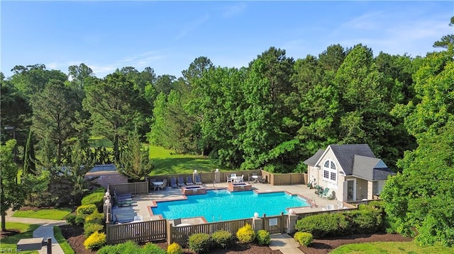 606 Queens Xing, Williamsburg, VA 23185 - view of pool with a fenced backyard, a patio area, an outbuilding, and a jacuzzi