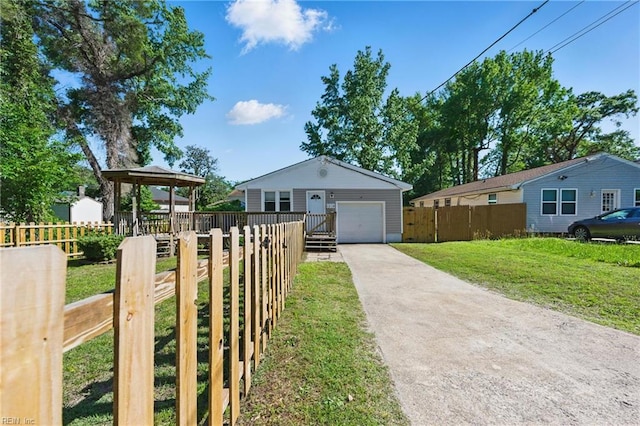 1219 Milton St, Norfolk, VA 23505 - view of front of house with concrete driveway, a garage, and a gazebo