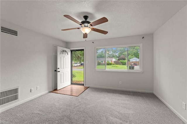3521 Melinda Pl, Virginia Beach, VA 23452 - spare room with carpet, a ceiling fan, baseboards, and a textured ceiling