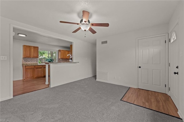3521 Melinda Pl, Virginia Beach, VA 23452 - unfurnished living room with ceiling fan and carpet flooring
