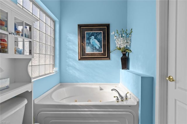 2673 Einstein Dr, Virginia Beach, VA 23456 - full bathroom with a tub with jets and toilet