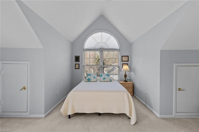 2673 Einstein Dr, Virginia Beach, VA 23456 - bedroom featuring lofted ceiling, light carpet, and baseboards