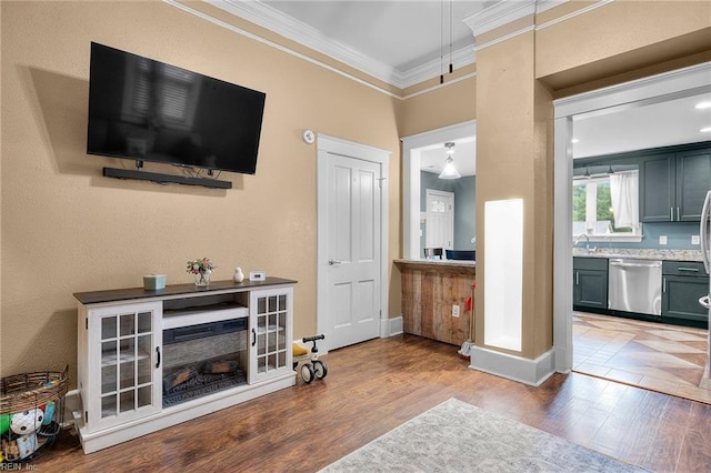 804 E Pembroke Ave, Hampton, VA 23669 - living room with ornamental molding, wood finished floors, and baseboards