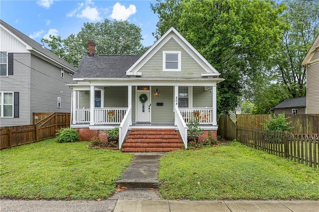 804 E Pembroke Ave, Hampton, VA 23669 - bungalow-style house featuring a porch, a chimney, and roof with shingles