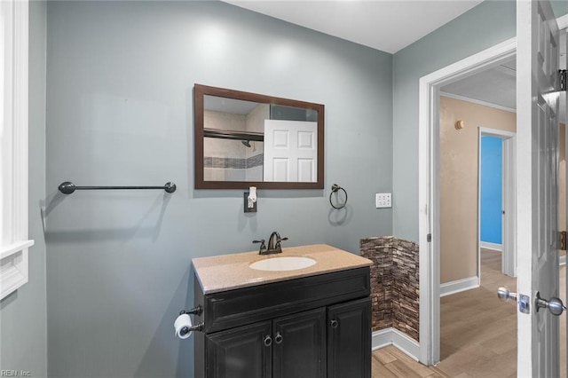 1204 Elder Ave, Chesapeake, VA 23325 - bathroom with wood finished floors, vanity, and baseboards