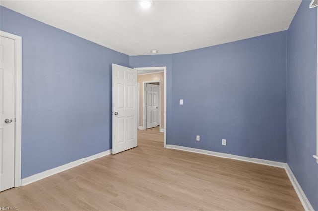 1204 Elder Ave, Chesapeake, VA 23325 - unfurnished bedroom with light wood finished floors and baseboards